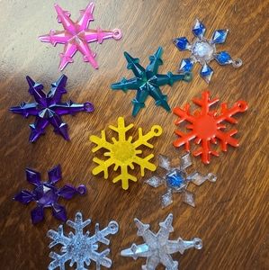 Homemade snowflake ornaments, and zipper pulls